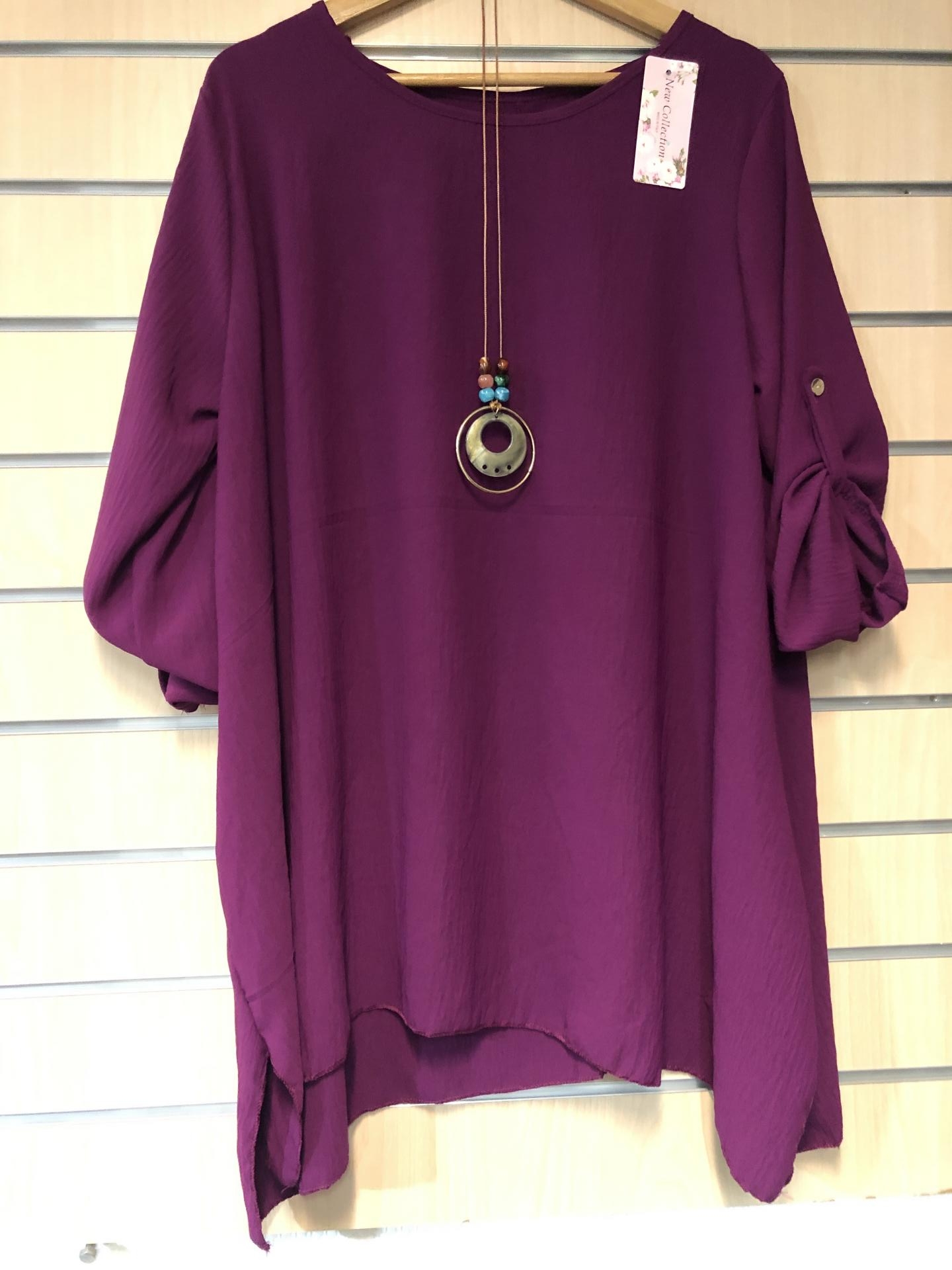 Tunique-chemise ample uni avec collier.