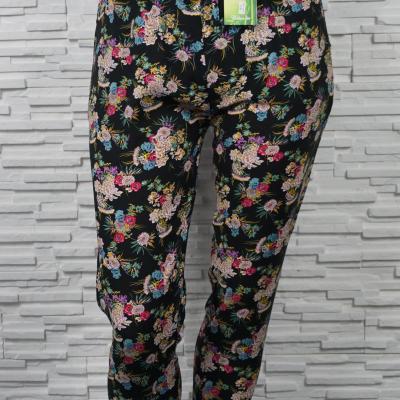 Pantalon fleuri élastiqué en coton.