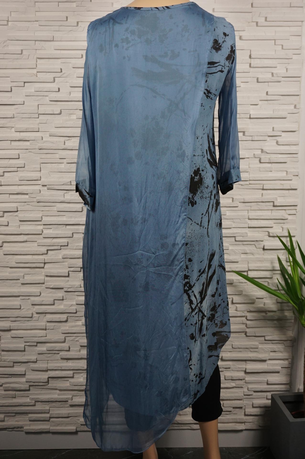 Robe longue drapée soie.