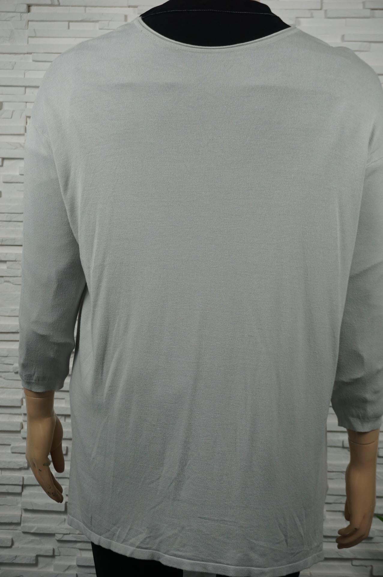 Robe ou pull long uni col V.