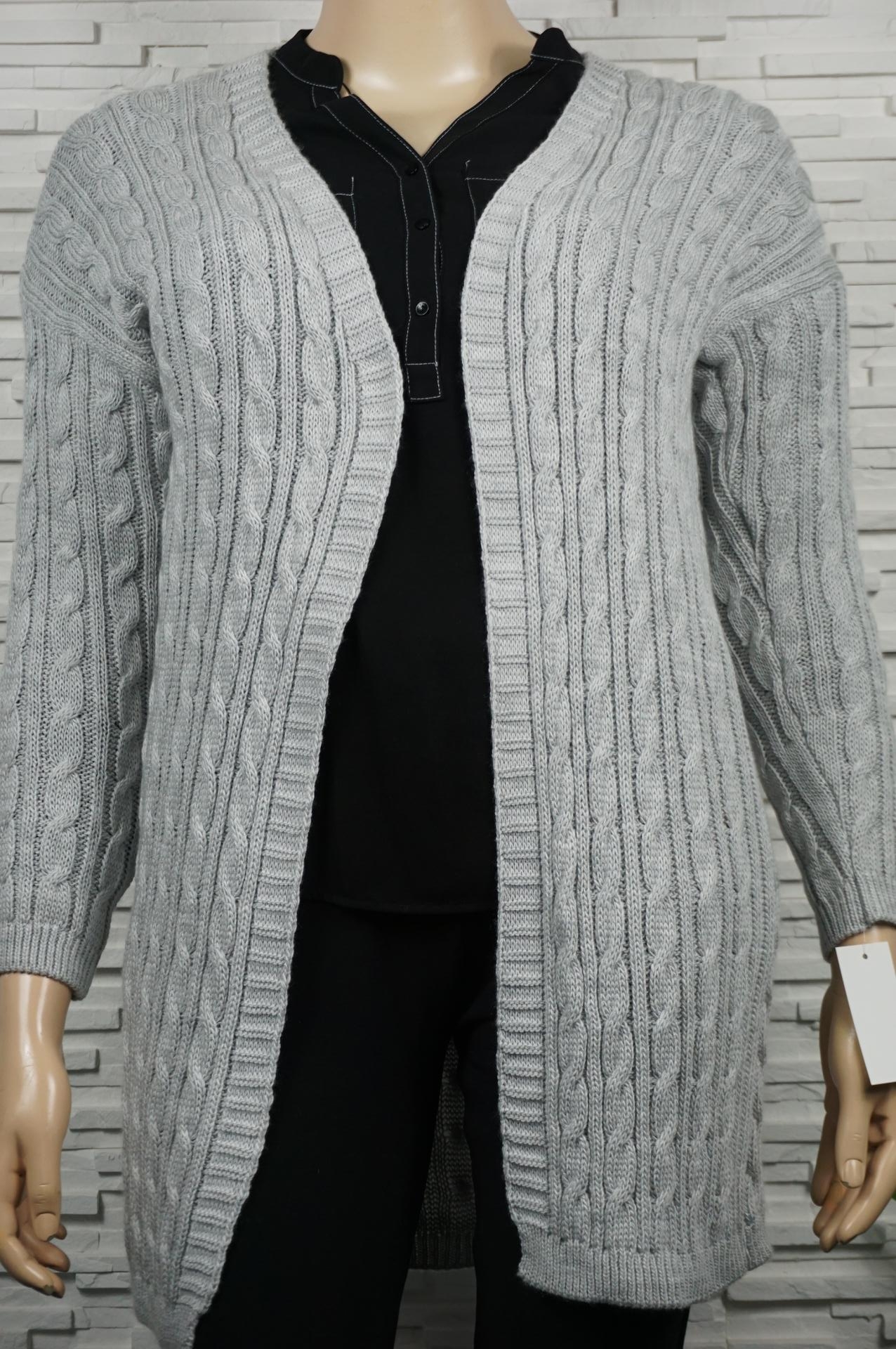 Gilet long torsadé.