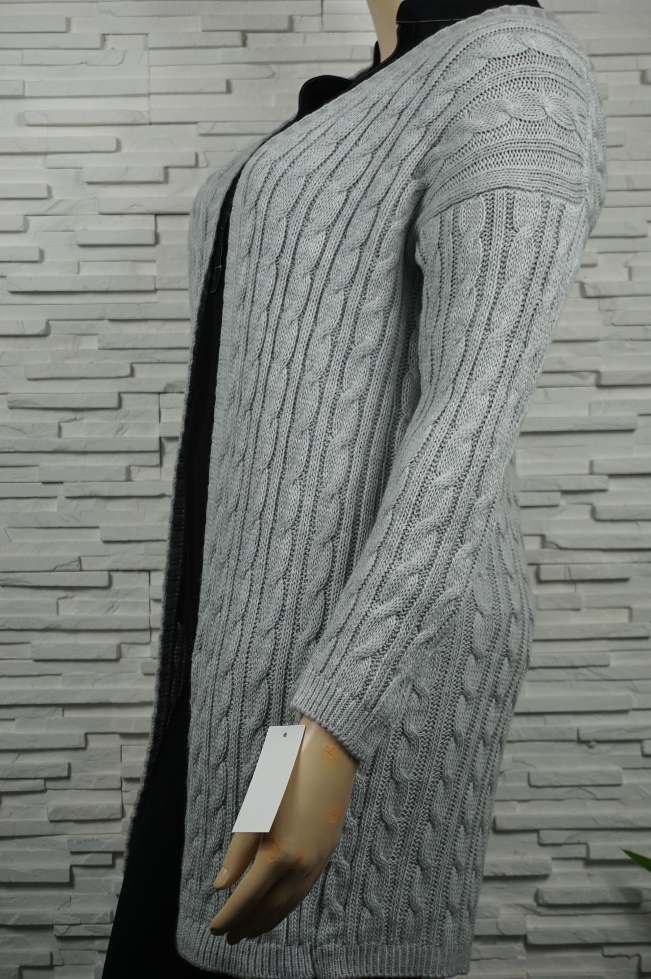 Gilet long torsadé.