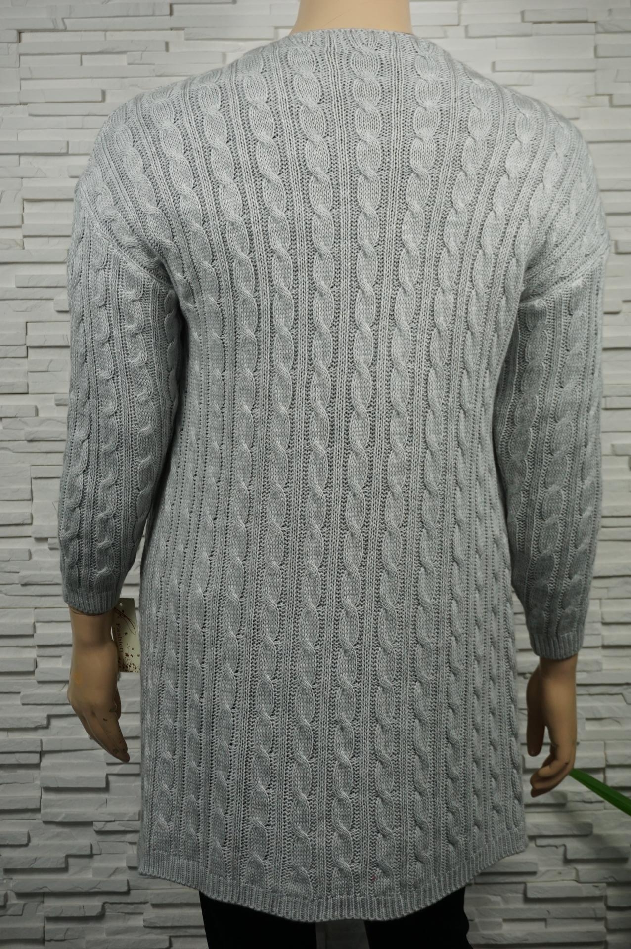 Gilet long torsadé.